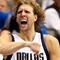 DALLAS - NOVEMBER 18:  Forward Dirk Nowitzki #41 of the Dallas Mavericks reacts after scoring in overtime against the San Antonio Spurs on November 18, 2009 at American Airlines Center in Dallas, Texas.  NOTE TO USER: User expressly acknowledges and agrees that, by downloading and/or using this Photograph, user is consenting to the terms and conditions of the Getty Images License Agreement.  (Photo by Ronald Martinez/Getty Images)