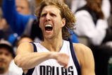 DALLAS - NOVEMBER 18:  Forward Dirk Nowitzki #41 of the Dallas Mavericks reacts after scoring in overtime against the San Antonio Spurs on November 18, 2009 at American Airlines Center in Dallas, Texas.  NOTE TO USER: User expressly acknowledges and agrees that, by downloading and/or using this Photograph, user is consenting to the terms and conditions of the Getty Images License Agreement.  (Photo by Ronald Martinez/Getty Images)