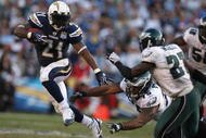 SAN DIEGO, CA - NOVEMBER 15:  Runningback LaDainian Tomlinson #21 of the San DIego Chargers runs for a gain during the game against the Philadelphia Eagles on November 15, 2009 at Qualcomm Stadium in San Diego, California. Chargers won 31-23. (Photo by Donald Miralle/Getty Images