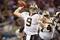 ST. LOUIS - NOVEMBER 15:  Quarterback Drew Brees #9 of the New Orleans Saints passes the ball during the game against the St. Louis Rams at the Edward Jones Dome on November 15, 2009 in St. Louis, Missouri.  (Photo by Dilip Vishwanat/Getty Images)