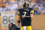 PITTSBURGH - NOVEMBER 15:  Quarterback Ben Roethlisberger #7 of the Pittsburgh Steelers looks at his wrist band for a play prior to the snap of the ball behind center during their game against the Cincinnati Bengals at Heinz Field on November 15, 2009 in Pittsburgh, Pennsylvania. The Bengals defeated the Steelers 18-12. (Photo by Rick Stewart/Getty Images)