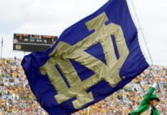 SOUTH BEND, IN - SEPTEMBER 17:  The Notre Dame Fighting Irish mascot carries the school flag on the field before the game against the Michigan State Spartans on September 17, 2005 at Notre Dame Stadium in South Bend, Indiana.  (Photo by Elsa/Getty Images)