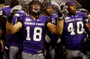 FORT WORTH, TX - NOVEMBER 14: Ryan Christian #18 of the TCU Horned Frogs celebrates his teams 55-28 victory over the Utah Utes at Amon G. Carter Stadium on November 14, 2009 in Fort Worth, Texas. (Photo by Ronald Martinez/Getty Images)