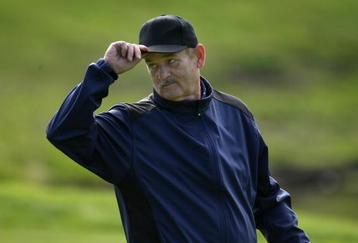 PEBBLE BEACH, CA - FEBRUARY 13:  Comedian Bill Murray tips his cap to the crowd on the 10th hole during the second round of the AT&T Pebble Beach National Pro-Am at Poppy Hills Golf Course on February 13, 2009 in Pebble Beach, California.  (Photo by Stephen Dunn/Getty Images)