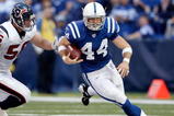 INDIANAPOLIS - NOVEMBER 08: Dallas Clark #44 of the Indianapolis Colts runs with the ball while defended by Brian Cushing #56 of the Houston Texans  during the NFL game at Lucas Oil Stadium on November 8, 2009 in Indianapolis, Indiana.The Colts won 20-17.  (Photo by Andy Lyons/Getty Images)