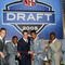 NEW YORK - APRIL 23:  (L-R) Alex Smith (Utah), Antrel Rolle (Miami), Aaron Rodgers (California), Braylon Edwards (Michigan),Ronnie Brown (Auburn) and Cedric Benson (Texas) pose during the 70th NFL Draft on April 23, 2005 at the Jacob K. Javits Convention Center in New York City.  (Photo by Chris Trotman/Getty Images)