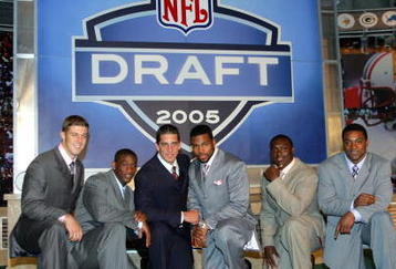 NEW YORK - APRIL 23:  (L-R) Alex Smith (Utah), Antrel Rolle (Miami), Aaron Rodgers (California), Braylon Edwards (Michigan),Ronnie Brown (Auburn) and Cedric Benson (Texas) pose during the 70th NFL Draft on April 23, 2005 at the Jacob K. Javits Convention Center in New York City.  (Photo by Chris Trotman/Getty Images)
