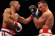 OAKLAND, CA - NOVEMBER 21:  Mikkel Kessler of Denmark (R) is hit by Andre Ward during their WBA Super Middleweight Championship Bout at the Oakland-Alameda County Coliseum on November 21, 2009 in Oakland, California.  (Photo by Jed Jacobsohn/Getty Images)