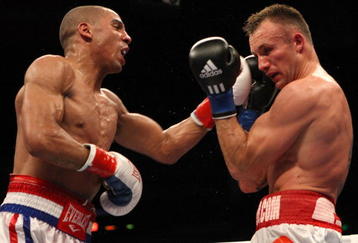 OAKLAND, CA - NOVEMBER 21:  Mikkel Kessler of Denmark (R) is hit by Andre Ward during their WBA Super Middleweight Championship Bout at the Oakland-Alameda County Coliseum on November 21, 2009 in Oakland, California.  (Photo by Jed Jacobsohn/Getty Images)