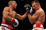 OAKLAND, CA - NOVEMBER 21:  Mikkel Kessler of Denmark (R) is hit by Andre Ward during their WBA Super Middleweight Championship Bout at the Oakland-Alameda County Coliseum on November 21, 2009 in Oakland, California.  (Photo by Jed Jacobsohn/Getty Images)