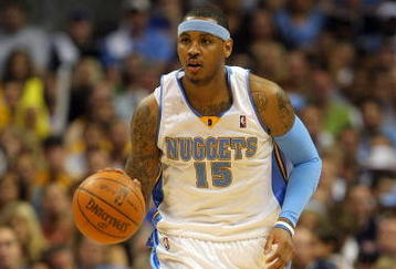 DENVER - MAY 29:  Carmelo Anthony #15 of the Denver Nuggets moves the ball in Game Six of the Western Conference Finals during the 2009 NBA Playoffs against the Los Angeles Lakers at Pepsi Center on May 29, 2009 in Denver, Colorado. NOTE TO USER: User expressly acknowledges and agrees that, by downloading and or using this photograph, User is consenting to the terms and conditions of the Getty Images License Agreement.  (Photo by Doug Pensinger/Getty Images)