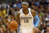 DENVER - MAY 29:  Carmelo Anthony #15 of the Denver Nuggets moves the ball in Game Six of the Western Conference Finals during the 2009 NBA Playoffs against the Los Angeles Lakers at Pepsi Center on May 29, 2009 in Denver, Colorado. NOTE TO USER: User expressly acknowledges and agrees that, by downloading and or using this photograph, User is consenting to the terms and conditions of the Getty Images License Agreement.  (Photo by Doug Pensinger/Getty Images)
