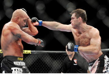 LAS VEGAS - NOVEMBER 21: Tito Ortiz (L) battles Forrest Griffin (R) during their Light Heavyweight Fight at the UFC 106 at Mandalay Bay Events Center on November 21, 2009 in Las Vegas, Nevada. (Photo by Jon Kopaloff/Getty Images)