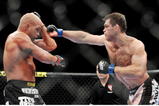 LAS VEGAS - NOVEMBER 21: Tito Ortiz (L) battles Forrest Griffin (R) during their Light Heavyweight Fight at the UFC 106 at Mandalay Bay Events Center on November 21, 2009 in Las Vegas, Nevada. (Photo by Jon Kopaloff/Getty Images)