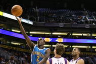 PHOENIX - NOVEMBER 11:  Darren Collison #2 of the New Orleans Hornets lays up a shot during the NBA game against the Phoenix Suns at US Airways Center on November 11, 2009 in Phoenix, Arizona. The Suns defeated the Hornets 124-104.  NOTE TO USER: User expressly acknowledges and agrees that, by downloading and or using this photograph, User is consenting to the terms and conditions of the Getty Images License Agreement.  (Photo by Christian Petersen/Getty Images)