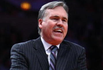 NEW YORK - MARCH 18:  Head coach Mike D'Antoni of the New York Knicks reacts at a referee against the New Jersey Nets at Madison Square Garden March 18, 2009 in New York City. NOTE TO USER: User expressly acknowledges and agrees that, by downloading and/or using this Photograph, User is consenting to the terms and conditions of the Getty Images License Agreement.  (Photo by Chris McGrath/Getty Images)