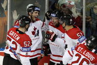 QUEBEC CITY - MAY 16:  Brent Burns #8 of Canada congratulates teammates Daniel Heatley #15, Mike Green #52 and Ryan Getzlaf #51 after Heatley scored in the first period against Sweden during the Semifinal round of the International Ice Hockey Federation World Championship at the Colisee Pepsi May 16, 2008 in Quebec City, Canada.  (Photo by Elsa/Getty Images)