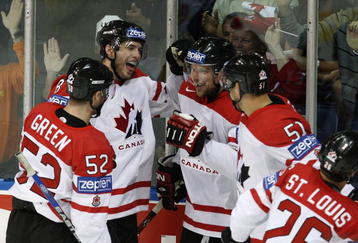 QUEBEC CITY - MAY 16:  Brent Burns #8 of Canada congratulates teammates Daniel Heatley #15, Mike Green #52 and Ryan Getzlaf #51 after Heatley scored in the first period against Sweden during the Semifinal round of the International Ice Hockey Federation World Championship at the Colisee Pepsi May 16, 2008 in Quebec City, Canada.  (Photo by Elsa/Getty Images)
