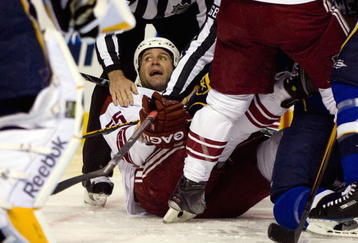 ST. LOUIS, MO - OCTOBER 29:  Ed Jovanovski #55 of the Phoenix Coyotes is taken to the ice against the St. Louis Blues at the Scottrade Center on October 29, 2009 in St. Louis, Missouri.  (Photo by Dilip Vishwanat/Getty Images)