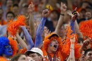 NEW ORLEANS - APRIL 5:  Syracuse fans cheer their team on during the semifinal round of the NCAA Final Four Tournament against Texas on April 5, 2003 at the Louisiana Superdome in New Orleans, Louisiana.  (Photo by Craig Jones/Getty Images)