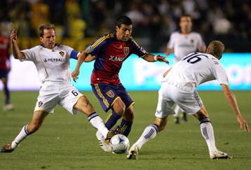 CARSON, CA - JUNE 13:  Eddie Lewis #6 and Gregg Berhalter #16 of the Los Angeles Galaxy defend Javier Morales #11 of Real Salt Lake during the MLS match at The Home Depot Center on June 13, 2009 in Carson, California. Real Salt Lake defeated the Galaxy 2-0.  (Photo by Victor Decolongon/Getty Images)