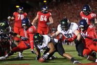 TUCSON, AZ - NOVEMBER 21:  Defensive end Will Tukuafu #39 of the Oregon Ducks recovers a fumble from David Roberts #81 of the Arizona Wildcats in the endzone during the college football game at Arizona Stadium on November 21, 2009 in Tucson, Arizona. The Ducks defeated the Wildcats 44-41 in second overtime. (Photo by Christian Petersen/Getty Images)