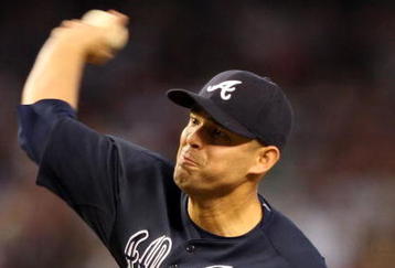 PHOENIX - MAY 30:  Starting pitcher Javier Vazquez #33 of the Atlanta Braves pitches against the Arizona Diamondbacks during the major league baseball game at Chase Field on May 30, 2009 in Phoenix, Arizona.  (Photo by Christian Petersen/Getty Images)