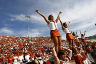 WACO, TX - NOVEMBER 14:  Texas Longhorn cheerleaders cheer on their team during the second half as the Longhorns take on the Baylor Bears on November 14, 2009 at Floyd Casey Stadium in Waco, Texas.  The Longhorns beat the Bears 47-14.  (Photo by Tom Pennington/Getty Images)