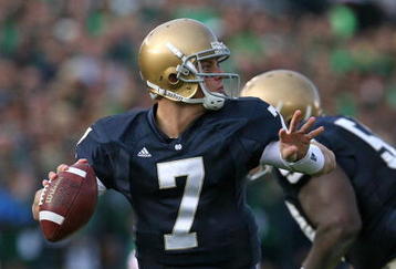 SOUTH BEND, IN - OCTOBER 17: Jimmy Clausen #7 of the Notre Dame Fighting Irish looks for a receiver against the USC Trojans at Notre Dame Stadium on October 17, 2009 in South Bend, Indiana. USC defeated Notre Dame 34-27. (Photo by Jonathan Daniel/Getty Images)