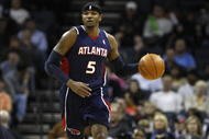 CHARLOTTE, NC - NOVEMBER 6:  Josh Smith #5 of the Atlanta Hawks drives the ball up court during the game against the Charlotte Bobcats on November 6, 2009 at Time Warner Cable Arena in Charlotte, North Carolina.  The Bobcats won 103-83.  NOTE TO USER: User expressly acknowledges and agrees that, by downloading and/or using this Photograph, user is consenting to the terms and conditions of the Getty Images License Agreement.  (Photo by Streeter Lecka/Getty Images)
