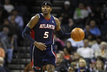 CHARLOTTE, NC - NOVEMBER 6:  Josh Smith #5 of the Atlanta Hawks drives the ball up court during the game against the Charlotte Bobcats on November 6, 2009 at Time Warner Cable Arena in Charlotte, North Carolina.  The Bobcats won 103-83.  NOTE TO USER: User expressly acknowledges and agrees that, by downloading and/or using this Photograph, user is consenting to the terms and conditions of the Getty Images License Agreement.  (Photo by Streeter Lecka/Getty Images)