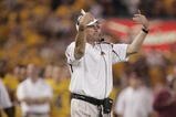 MINNEAPOLIS, MN - SEPTEMBER 29:  Head Coach Tim Brewster of the Minnesota Golden Gophers gestures to his players against the Ohio State Buckeyes during the game at the Metrodome on September 29, 2007 in Minneapolis, Minnesota.  Ohio State defeated Minnesota 30-7. (Photo by Jeff Gross/Getty Images)