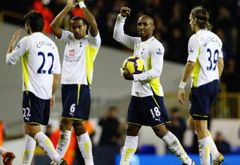 LONDON, ENGLAND - NOVEMBER 22:  Jermain Defoe of Tottenham Hotspur collects the match ball after scoring five during the Barclays Premier League match between Tottenham Hotspur and Wigan Athletic at White Hart Lane on November 22, 2009 in London, England.  (Photo by Clive Rose/Getty Images)