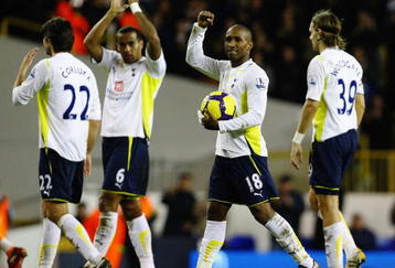 LONDON, ENGLAND - NOVEMBER 22:  Jermain Defoe of Tottenham Hotspur collects the match ball after scoring five during the Barclays Premier League match between Tottenham Hotspur and Wigan Athletic at White Hart Lane on November 22, 2009 in London, England.  (Photo by Clive Rose/Getty Images)
