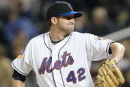 NEW YORK - APRIL 15:  Bobby Parnell of the New York Mets pitches to the San Diego Padres on April 15, 2009 at Citi Field in the Flushing neighborhood of the Queens borough of New York City.   All Major League Baseball players are wearing #42 in honor of Jackie Robinson day.  (Photo by Ezra Shaw/Getty Images)