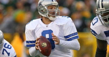 GREEN BAY, WI - NOVEMBER 15: Tony Romo #8 of the Dallas Cowboysdrops back to pass against the Green Bay Packers at Lambeau Field on November 15, 2009 in Green Bay, Wisconsin. The Packers defeated the Cowboys 17-7. (Photo by Jonathan Daniel/Getty Images)