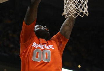 MILWAUKEE - MARCH 07: Rick Jackson #00 of the Syracuse Orange dunks the ball against the Marquette Golden Eagles on March 7, 2009 at the Bradley Center in Milwaukee, Wisconsin. Syracuse defeated Marquette 86-79 in overtime. (Photo by Jonathan Daniel/Getty Images)