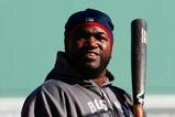 BOSTON - OCTOBER 11:  David Ortiz #34 of the Boston Red Sox looks on during batting practice before Game Three of the ALDS against the Los Angeles Angels of Anaheim during the 2009 MLB Playoffs at Fenway Park on October 11, 2009 in Boston, Massachusetts. (Photo by Jim Rogash/Getty Images)