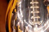 NEW ORLEANS - DECEMBER 21: Ronnie Thornton #56 of the Southern Mississippi Golden Eagles celebrates by kissing the trophy after defeating the Troy Trojans 30-27 in overtime to win the R+L Carriers New Orleans Bowl on December 21, 2008 at the Superdome in New Orleans, Louisiana. (Photo by Chris Graythen/Getty Images)