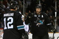 SAN JOSE, CA - DECEMBER 04: Joe Thornton #19 of the San Jose Sharks celebrates with Patrick Marleau #12 after Marleau scored a second period power play goal against the Columbus Blue Jackets during the NHL game at HP Pavilion on December 4, 2008 in San Jose, California. (Photo by Christian Petersen/Getty Images)