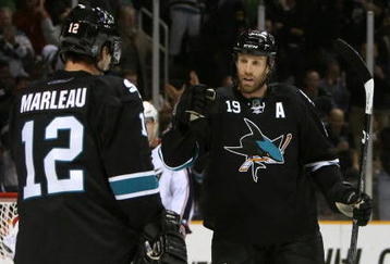 SAN JOSE, CA - DECEMBER 04:  Joe Thornton #19 of the San Jose Sharks celebrates with Patrick Marleau #12 after Marleau scored a second period power play goal against the Columbus Blue Jackets during the NHL game at HP Pavilion on December 4, 2008 in San Jose, California.  (Photo by Christian Petersen/Getty Images)