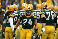 GREEN BAY, WI - NOVEMBER 30:  Aaron Kampman #74 of the Green Bay Packers takes the field during player ingtroductions against the Carolina Panthers at Lambeau Field on November 30, 2008 in Green Bay, Wisconsin. The Panthers won 35-31.  (Photo by Jonathan Daniel/Getty Images)