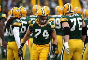 GREEN BAY, WI - NOVEMBER 30:  Aaron Kampman #74 of the Green Bay Packers takes the field during player ingtroductions against the Carolina Panthers at Lambeau Field on November 30, 2008 in Green Bay, Wisconsin. The Panthers won 35-31.  (Photo by Jonathan Daniel/Getty Images)