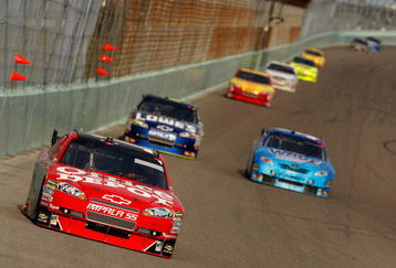 HOMESTEAD, FL - NOVEMBER 22:  Tony Stewart, driver of the #14 Office Depot/Old Spice Chevrolet, during the NASCAR Sprint Cup Series Ford 400 at Homestead-Miami Speedway on November 22, 2009 in Homestead, Florida.  (Photo by Chris Graythen/Getty Images)