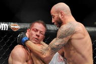 LAS VEGAS - NOVEMBER 21: Ben Saunders (R) battles Marcus Davis (L) during their Welterweight Fight at the UFC 106 at Mandalay Bay Events Center on November 21, 2009 in Las Vegas, Nevada. (Photo by Jon Kopaloff/Getty Images)