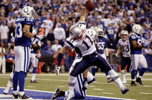 INDIANAPOLIS - NOVEMBER 15:  Julian Edelman #11 of the New England Patriots celebrates his touchdown in the second quarter of the game against the Indianapolis Colts at Lucas Oil Stadium on November 15, 2009 in Indianapolis, Indiana.  (Photo by Jamie Squire/Getty Images)