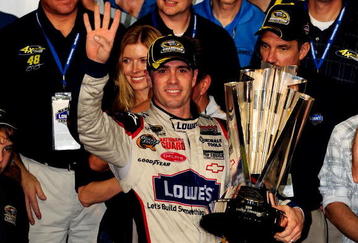 HOMESTEAD, FL - NOVEMBER 22:  Jimmie Johnson, driver of the #48 Lowe's Chevrolet, celebrates after winning the NASCAR Sprint Cup Series Championship after finishing in fifth place in the Ford 400 at Homestead-Miami Speedway on November 22, 2009 in Homestead, Florida. Johnson becomes the first driver in the history of NASCAR to win four consecutive championships since the sports inception in 1949.during the NASCAR Sprint Cup Series Ford 400 at Homestead-Miami Speedway on November 22, 2009 in Homestead, Florida.  (Photo by Sam Greenwood/Getty Images)
