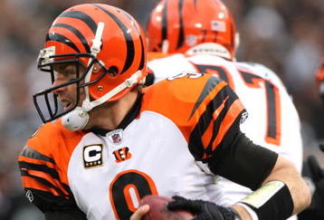 OAKLAND, CA - NOVEMBER 22:  Carson Palmer #9 of the Cincinnati Bengals runs with the ball against the Oakland Raiders during an NFL game at Oakland-Alameda County Coliseum on November 22, 2009 in Oakland, California. (Photo by Jed Jacobsohn/Getty Images)