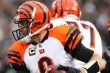 OAKLAND, CA - NOVEMBER 22:  Carson Palmer #9 of the Cincinnati Bengals runs with the ball against the Oakland Raiders during an NFL game at Oakland-Alameda County Coliseum on November 22, 2009 in Oakland, California. (Photo by Jed Jacobsohn/Getty Images)