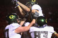 TUCSON, AZ - NOVEMBER 21:  Wide receiver Jeff Maehl #23 of the Oregon Ducks celebrates with teammates after scoring a second quarter touchdown against the Arizona Wildcats during the college football game at Arizona Stadium on November 21, 2009 in Tucson, Arizona.  The Ducks defeated the Wildcats 44-41 in second overtime.  (Photo by Christian Petersen/Getty Images)